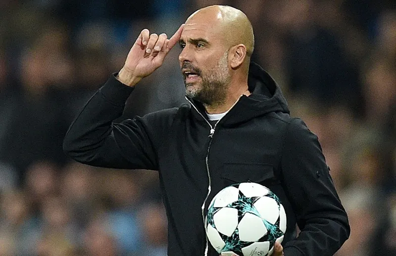 HLV Pep Guardiola không đặt áp lực thắng Champions League cùng Man.City. Ảnh: Getty Images