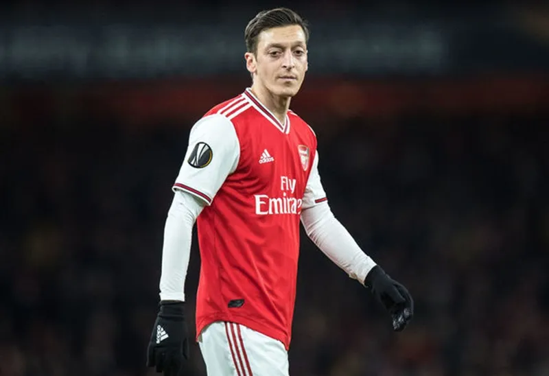 Mesut Oezil chỉ giảm lương khi biết chính xác về tổn thất của Arsenal. Ảnh: Getty Images 