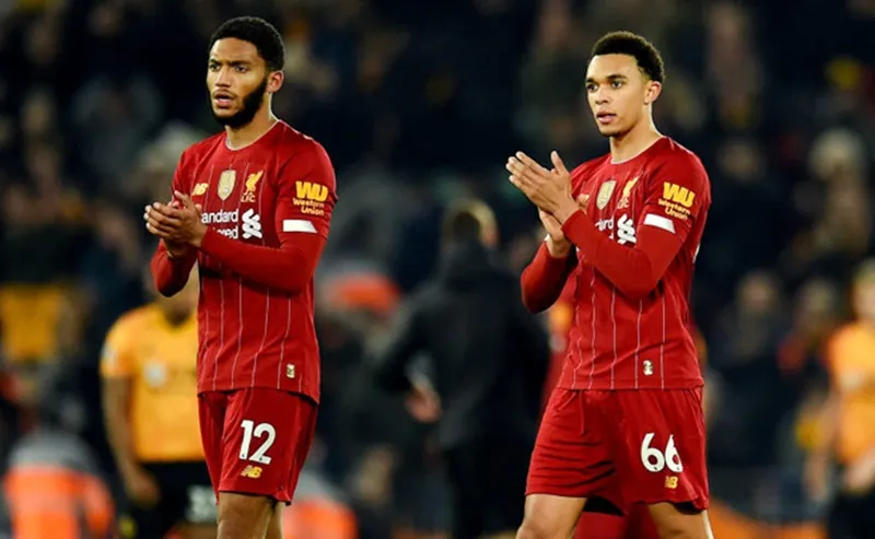 Liverpool mất 2 trụ trột phòng ngự Trent Alexander-Arnold (phải) và Joe Gomez trong vòng vài ngày. Ảnh: Getty Images 