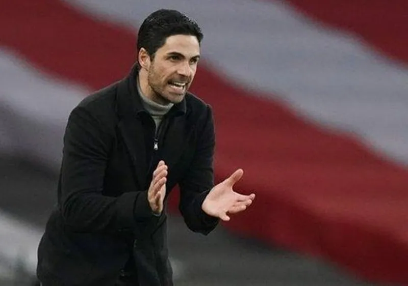 HLV Mikel Arteta nhẹ nhõm khi mùa giải vừa được giải cứu. Ảnh: Getty Images 