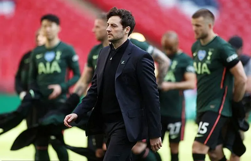 Ryan Mason không thất vọng khi nhận thức Tottenham kém xa Man.City. Ảnh: Getty Images