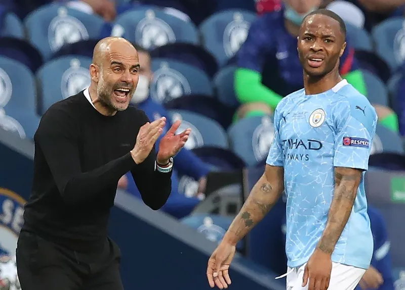 HLV Pep Guardiola và Raheem Sterling khi còn ở Man.City. Ảnh: Getty Images 
