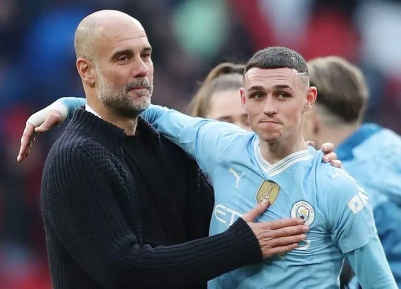 HLV Pep Guardiola ủng hộ Phil Foden cam kết tương lai để trở thành huyền thoại Man.City.