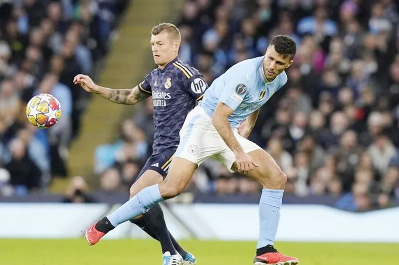 Toni Kroos Rodri.jpg