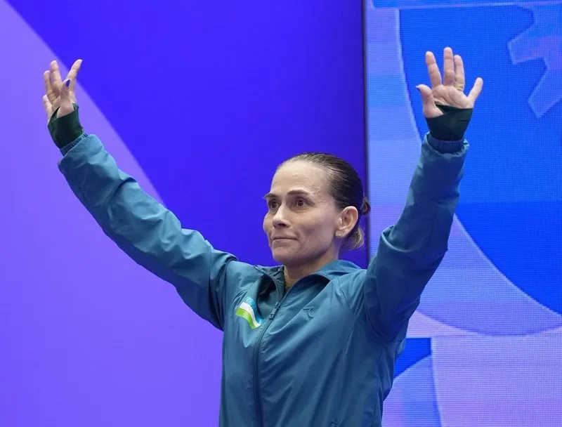 Huyền thoại Oksana Chusovitina đang tranh tài tại kỳ ASIAD thứ 7. Ảnh: THX