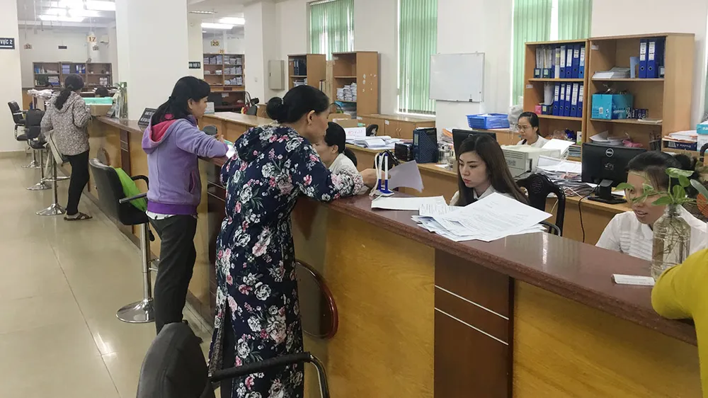 BHXH TPHCM tiếp nhận hồ sơ tham gia BHYT và điều chỉnh sai sót trong hồ sơ  của người tham gia BHYT hàng ngày