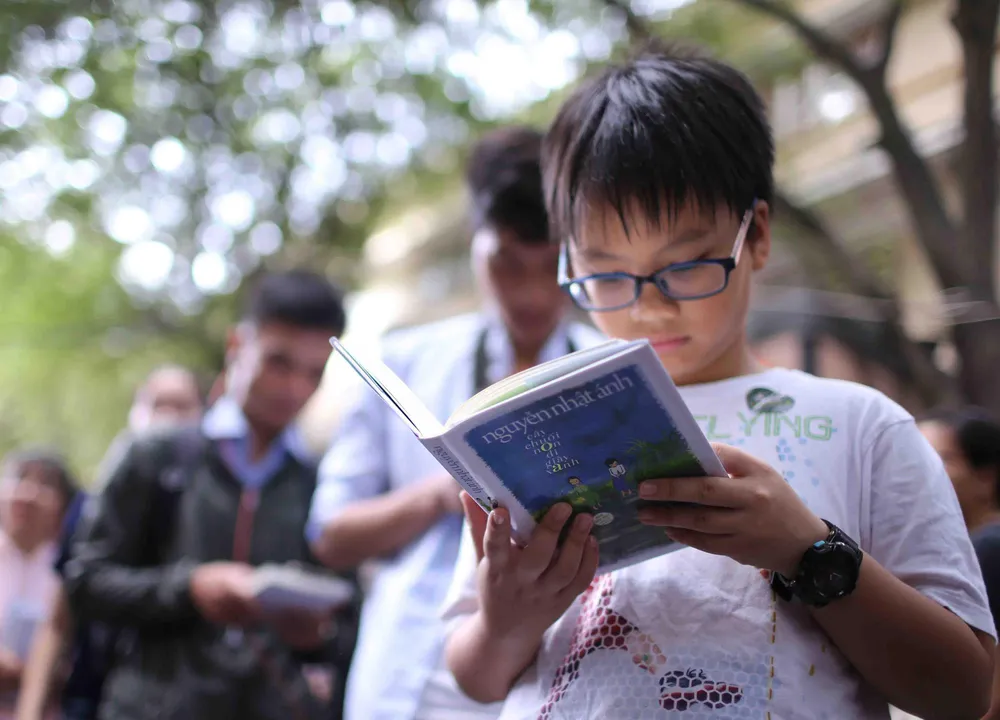 Việc đọc sách với trẻ nhỏ phải bắt đầu từ sự hứng thú           . Ảnh: DŨNG PHƯƠNG