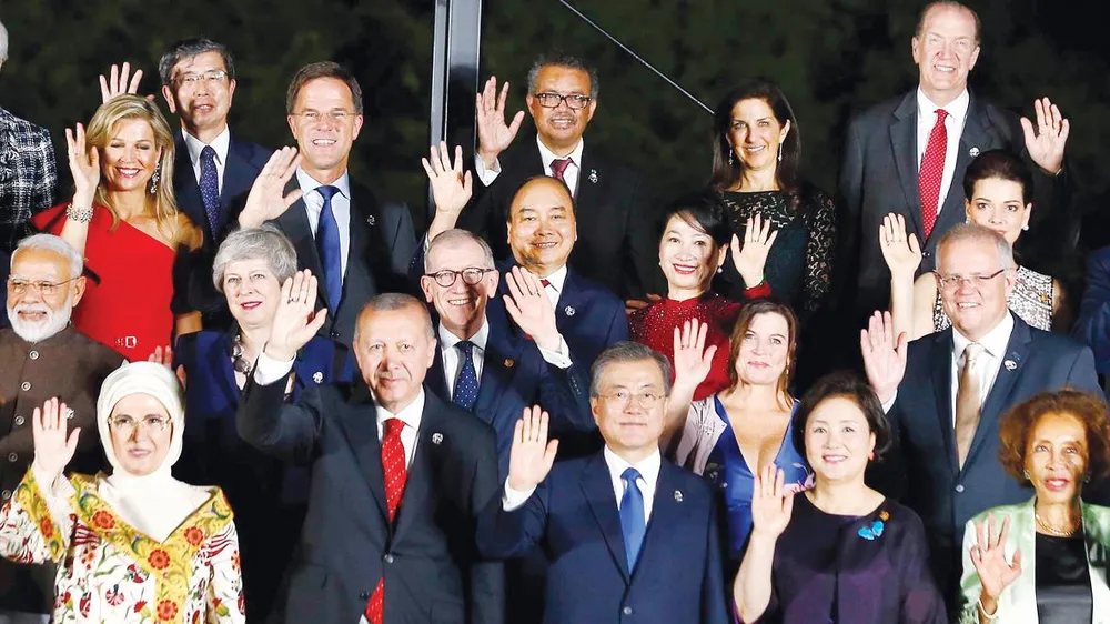 Thủ tướng Nguyễn Xuân Phúc và phu nhân cùng các Trưởng đoàn và phu nhân  dự Hội nghị Thượng đỉnh G20. Ảnh: TTXVN