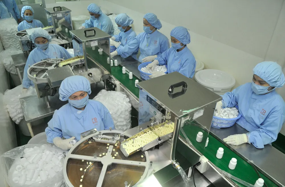 Doanh nghiệp kinh doanh có lãi mới dễ tiếp cận gói vay ưu đãi  (Sản xuất dược phẩm tại Công ty Pharmedic, TPHCM). Ảnh: CAO THĂNG