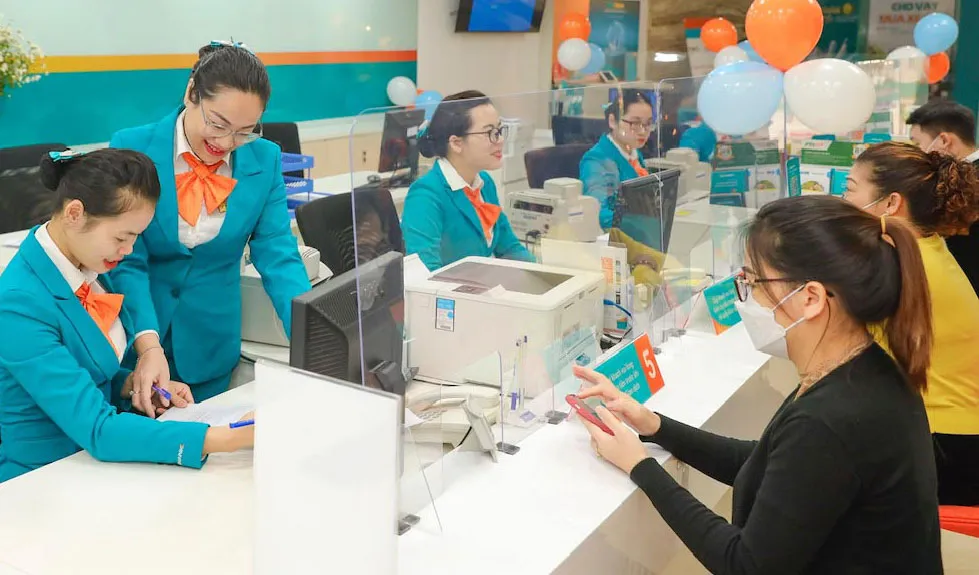 Sự bứt phá của tín dụng dịp cuối năm 2021 đã thúc đẩy lợi nhuận ngân hàng tăng mạnh.  Ảnh: PHAN LÊ 