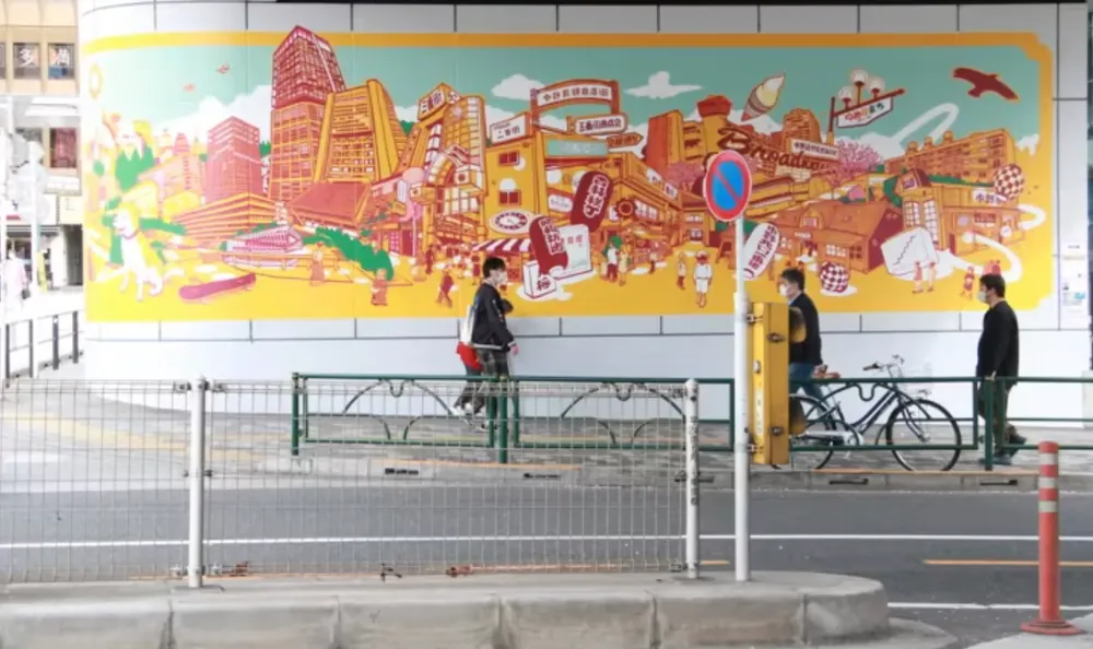 Bức tranh tường của bộ đôi nghệ sĩ WHOLE9 ở ga Nakano (Nhật Bản). Ảnh: ASIA NIKKEI