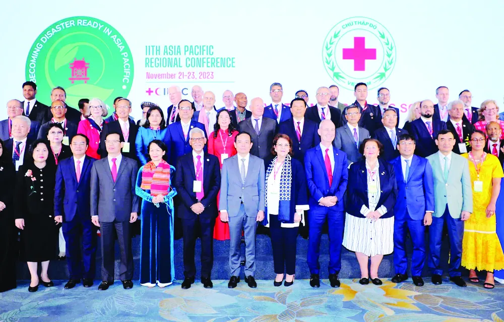 Phó Thủ tướng Trần Lưu Quang cùng các đại biểu dự hội nghị. Ảnh: TTXVN Phó Thủ tướng Trần Lưu Quang cùng các đại biểu dự hội nghị. Ảnh: TTXVN