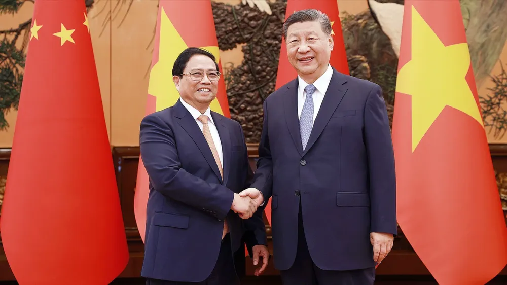 Thủ tướng Phạm Minh Chính hội kiến Tổng Bí thư, Chủ tịch Trung Quốc Tập Cận Bình. Ảnh: TTXVN