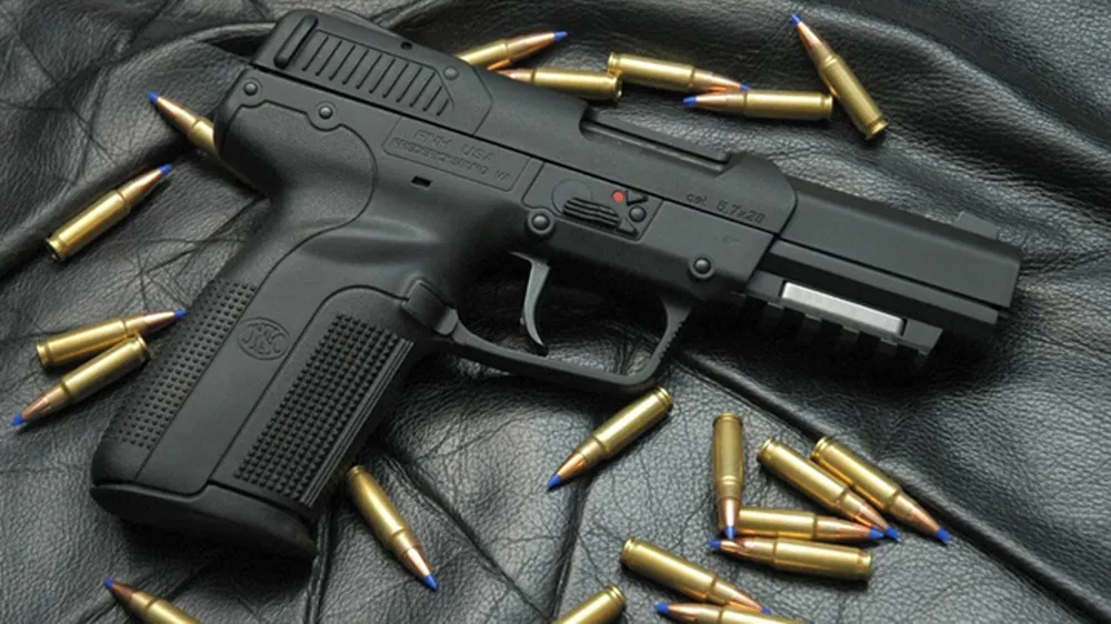 Kiểm tra khách sạn phát hiện súng cùng hàng trăm viên đạn ảnh 1