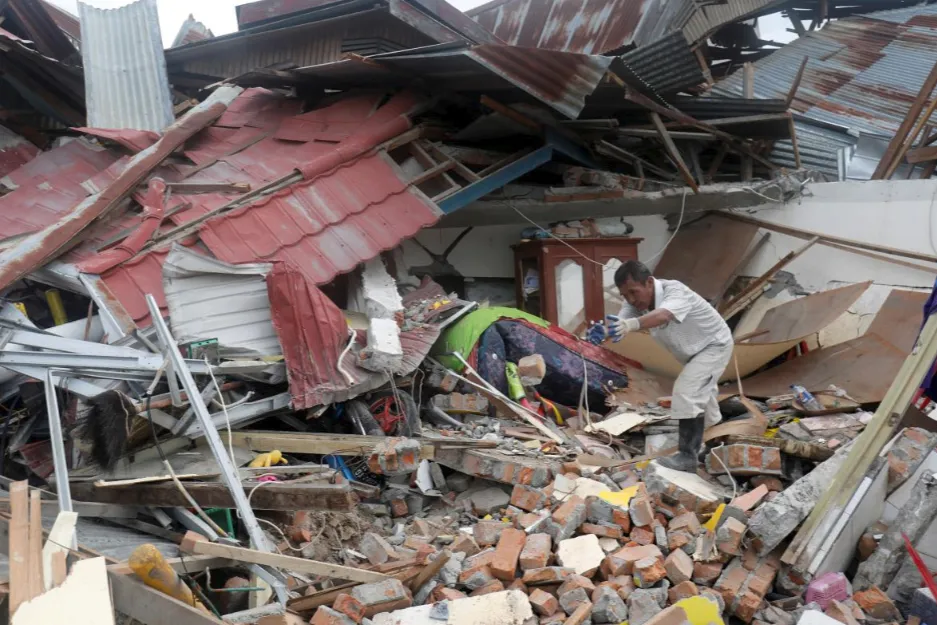 Ngày cuối cùng tìm kiếm nạn nhân vụ động đất, sóng thần tại Indonesia ảnh 7