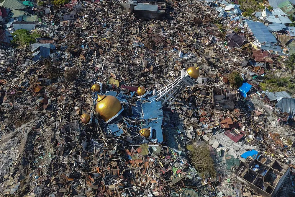 Ngày cuối cùng tìm kiếm nạn nhân vụ động đất, sóng thần tại Indonesia ảnh 4