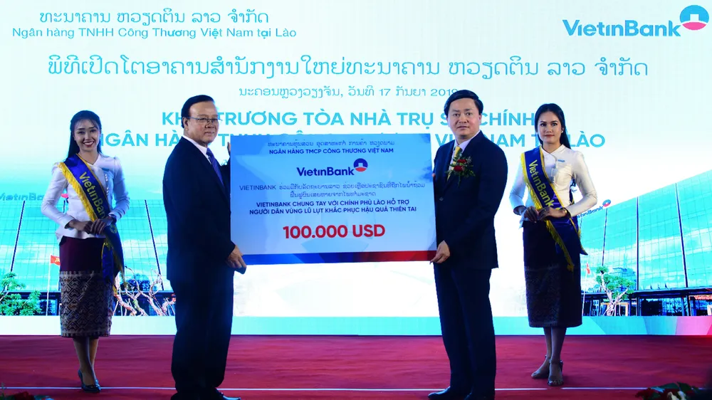 ​Phó Thủ tướng Lào tin tưởng VietinBank sẽ phát triển thành ngân hàng thương mại chủ lực tại Lào ảnh 5