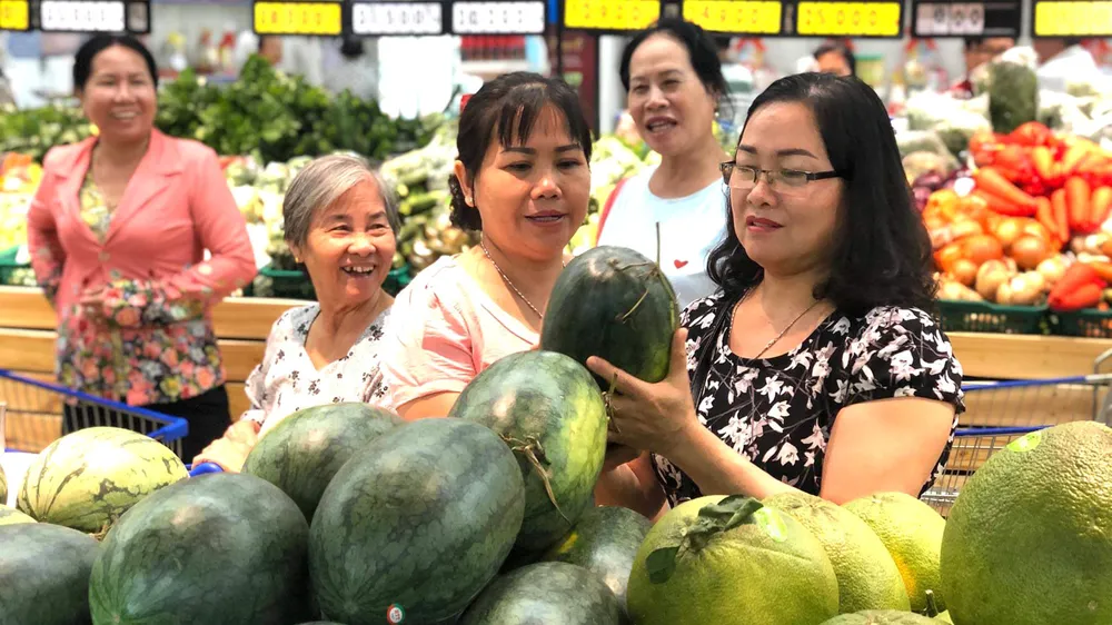 Nhộp nhịp sản xuất và mua sắm hàng tết ảnh 1