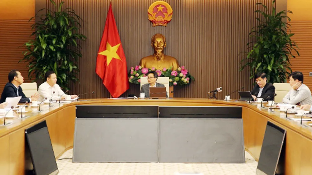 Phó Thủ tướng Vũ Đức Đam chủ trì cuộc họp sáng 13/11 của Ban Chỉ đạo quốc gia phòng, chống dịch Covid-19. Ảnh: VGP