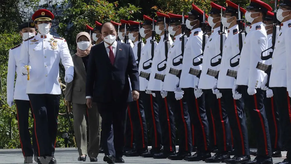 Chủ tịch nước Nguyễn Xuân Phúc hội kiến Tổng thống Singapore ảnh 8