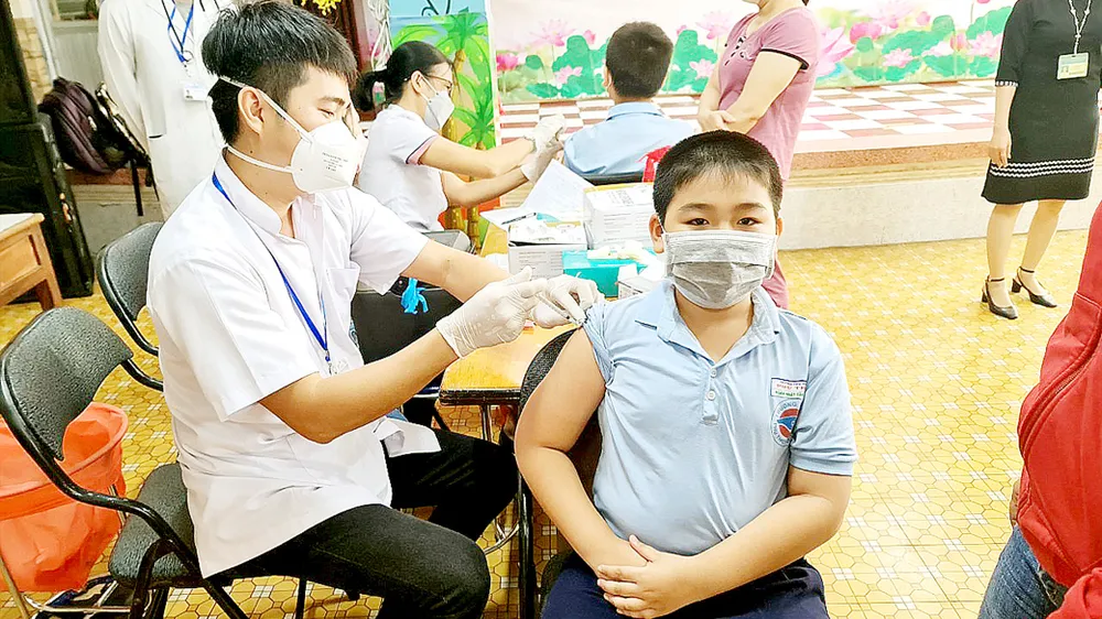 Tiêm vaccine Covid-19 cho trẻ từ 5 đến dưới 12 tuổi tại TPHCM. Ảnh: THÀNH SƠN