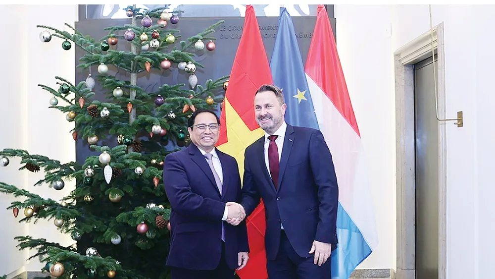 Thủ tướng Phạm Minh Chính và  Thủ tướng Luxembourg Xavier Bettel. Ảnh: TTXVN