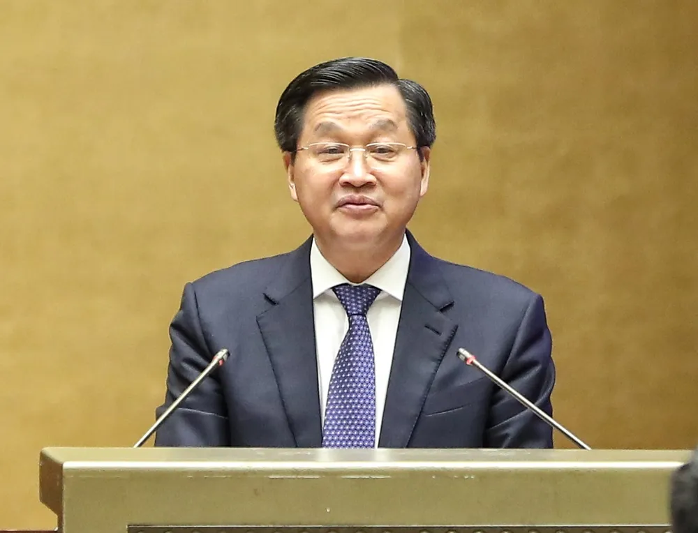 Phó Thủ tướng Lê Minh Khái phát biểu làm rõ các vấn đề liên quan và trả lời chất vấn của đại biểu Quốc hội, sáng 8-6. Ảnh: QUANG PHÚC