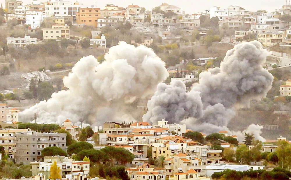 Hiện trường vụ không kích của Israel nhằm vào Hezbollah ở làng Khiam, miền Nam Lebanon vào ngày 31-10. Ảnh: TIMES OF ISRAEL