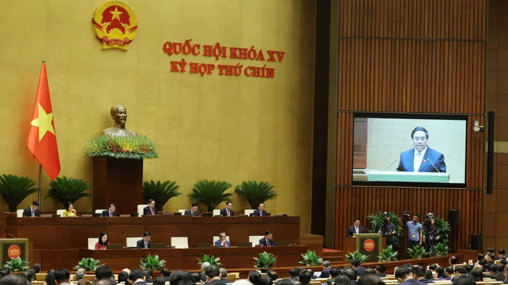 Thủ tướng Phạm Minh Chính trình bày báo cáo đánh giá bổ sung kết quả thực hiện kế hoạch phát triển kinh tế - xã hội và ngân sách nhà nước năm 2024. Ảnh: QUANG PHÚC