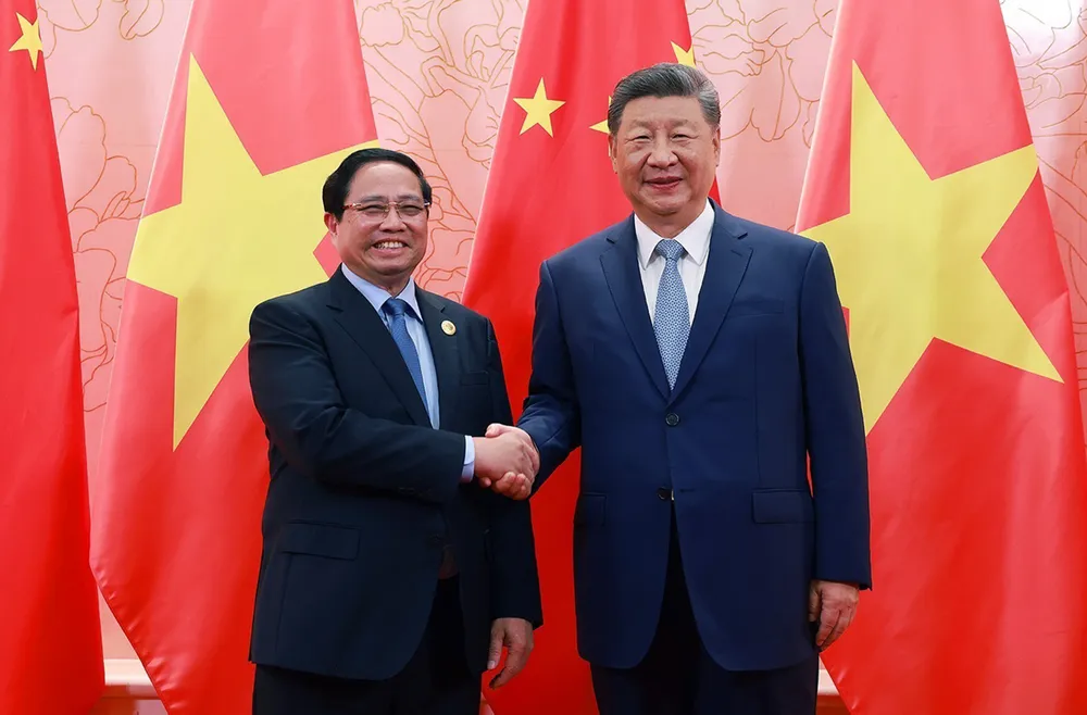 Thủ tướng Phạm Minh Chính hội kiến Tổng Bí thư, Chủ tịch nước Trung Quốc Tập Cận Bình, chiều 31-8. Ảnh: TTXVN