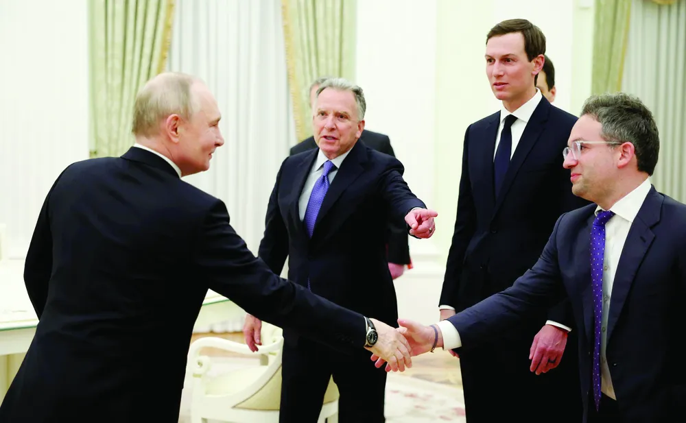 Tổng thống Nga Vladimir Putin tiếp các nhà đàm phán Mỹ, ngày 22-1. Ảnh: TASS