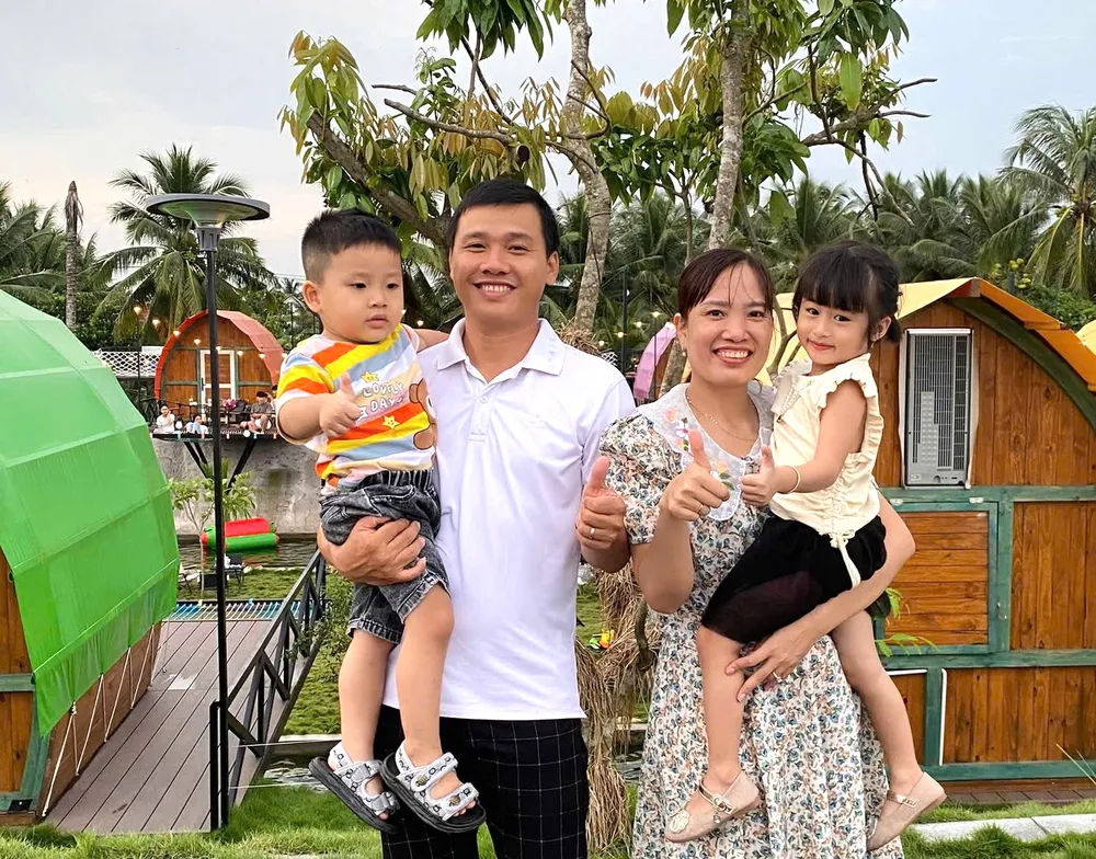 Gia đình bên nhau vui vẻ và hạnh phúc trong những ngày tết. Ảnh: THU HƯỜNG