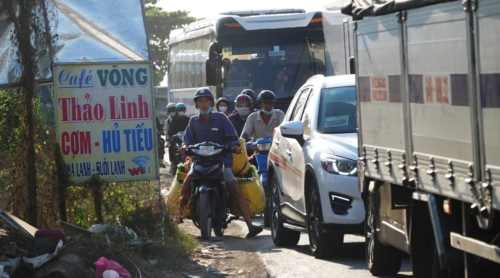 Ám ảnh những 'nút thắt cổ chai' trên QL1 - ảnh 2