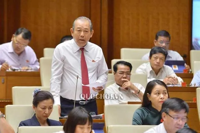 Deputy Prime Minister Truong Hoa Binh speaks at a question-and-answer session at the National Assembly’ today, June 4 - PHOTO: QUOCHOI.VN