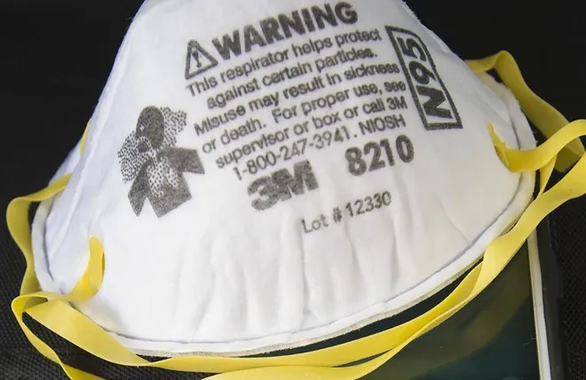 Tong thong Trump cam xuat khau thiet bi bao ho chong virus corona hinh anh 2 khautrangm3.jpg