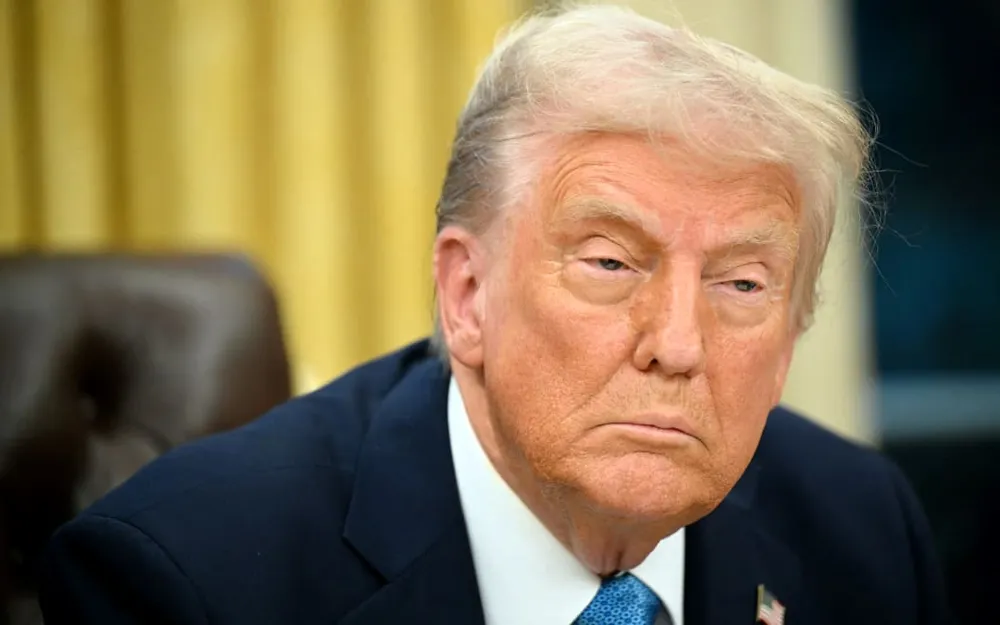 Tổng thống Hoa Kỳ Donald Trump phát biểu với báo chí sau khi ký lệnh hành pháp tại Phòng Bầu dục của Nhà Trắng ở Washington, DC vào ngày 31 tháng 1 năm 2025. Ảnh: MANDEL NGAN / AFP