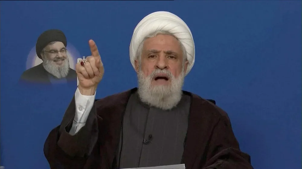 Lãnh đạo Hezbollah Naim Qassem( Ảnh: Al Manar TV/Reuters )