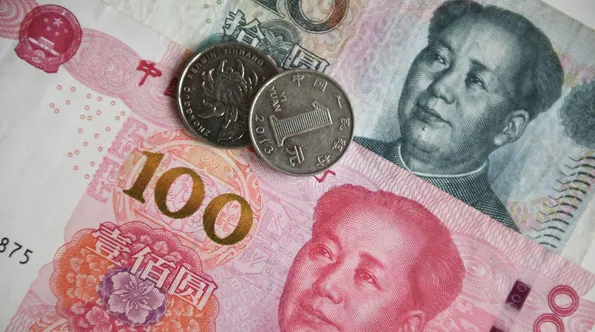 Tiền giấy và tiền xu của Trung Quốc. Ảnh: Sputnik