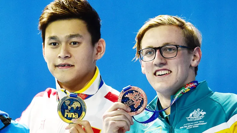Mack Horton (phải) và Sun Yang giờ đây đã là “tử địch” của nhau.