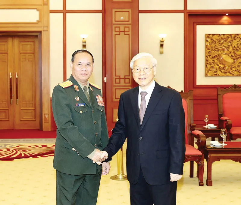 Tổng Bí thư Nguyễn Phú Trọng tiếp Đoàn đại biểu Quân đội Nhân dân Lào ảnh 1