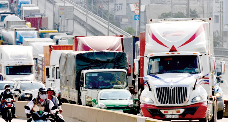 TPHCM sẽ tiến hành kiểm tra tài xế ô tô các loại, đặc biệt là tài xế xe container trên toàn địa bàn       Ảnh: THÀNH TRÍ