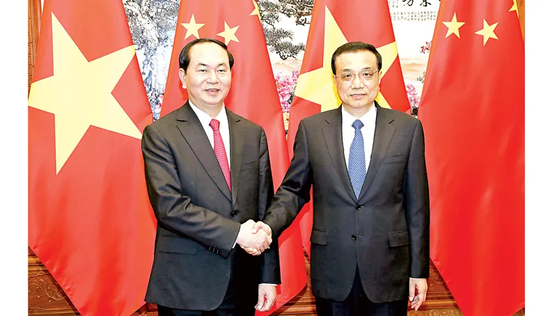 Chủ tịch nước Trần Đại Quang gặp Thủ tướng Trung Quốc Lý Khắc Cường. Ảnh:TTXVN