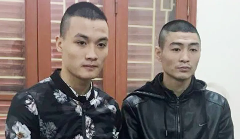   Lê Ngọc Sơn và Cao Văn Quân. Ảnh: Anninhthudo