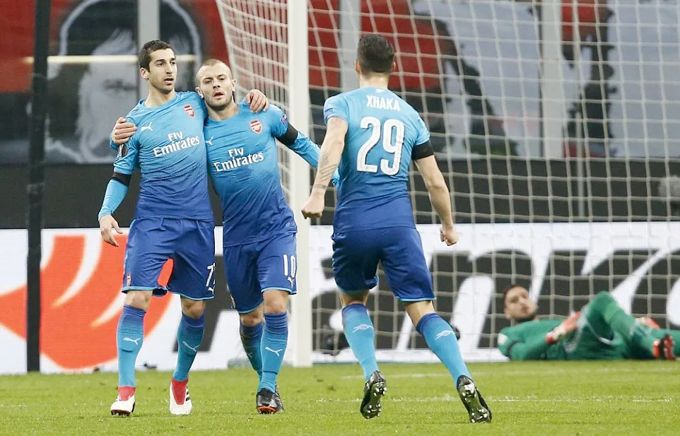 Niềm vui của các cầu thủ Arsenal trên sân San Siro