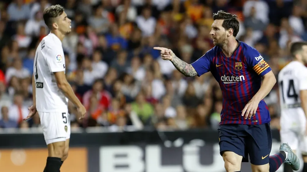 Messi sau khi ghi bàn vào lưới Valencia.