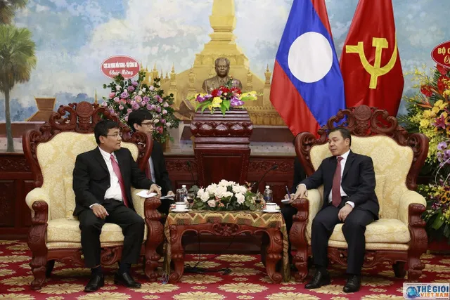 Thứ trưởng Ngoại giao Nguyễn Minh Vũ và Đại sứ Lào Sengphet Houngboungnuang. Ảnh: Thế giới và Việt Nam