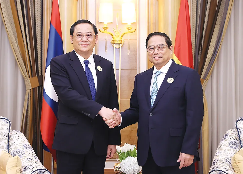 Thủ tướng Phạm Minh Chính gặp Thủ tướng Lào Sonexay Siphandone. Ảnh: TTXVN Thủ tướng Phạm Minh Chính gặp Thủ tướng Lào Sonexay Siphandone. Ảnh: TTXVN