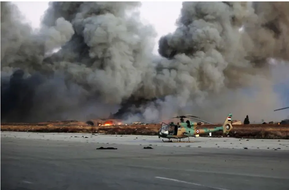 Một căn cứ không quân gần thủ đô Damacus, Syria bị Israel ném bom. Ảnh: CNN