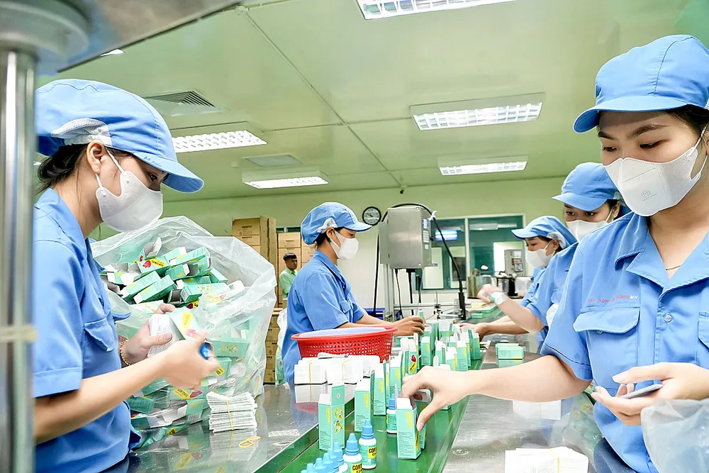 Hoạt động sản xuất tại một nhà máy ở TPHCM. Ảnh: HOÀNG HÙNG