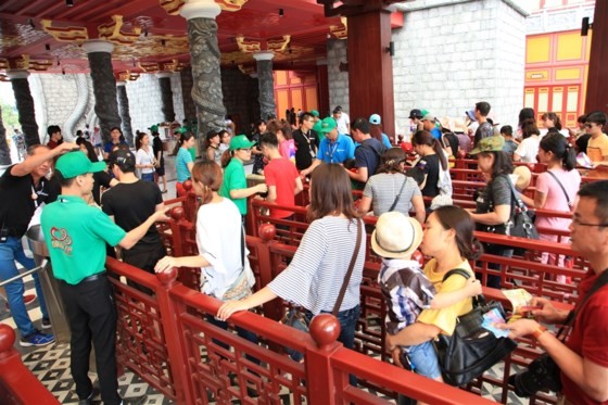 Visitors get line to buy tickets for 12 underwater games at Typhoon water park